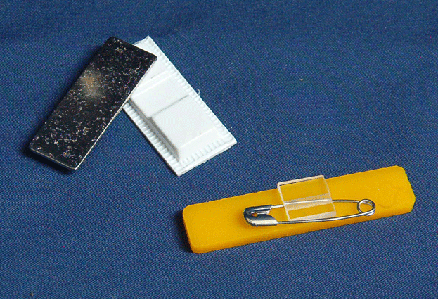 The Magnet badge attachment and the Safety Pin badge attachment