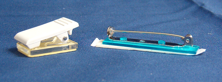 The Bulldog Clip badge attachment and the Straight Pin badge attachment